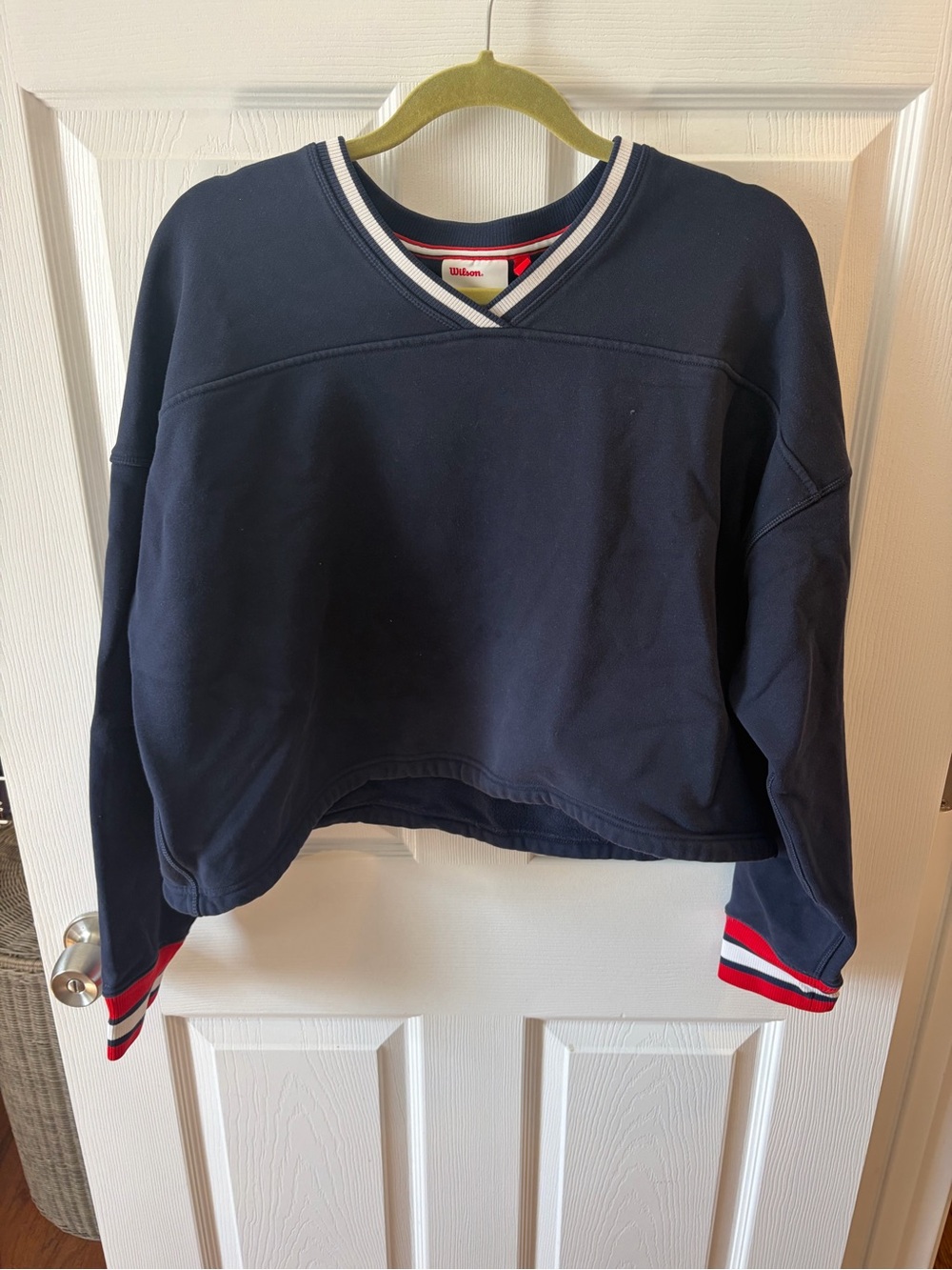 Wilson Women's Navy V-Neck Cropped Sweatshirt with Red and White Stripe Cuffs